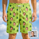 Man wearing Men's Avo Groove Custom Face Beach Shorts — custom faces printed all-over