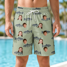 Model wearing Men's Gill Giggles Custom Face Beach Shorts printed with kids' faces
