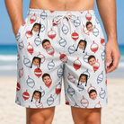 Model wearing Men's Bobber Bop Custom Face Beach Shorts printed with kids' faces