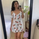 Real-life photo of someone wearing Women's Bobber Bop Custom Face Off-Shoulder Dress — custom faces printed all-over