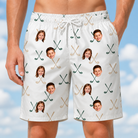 Model wearing Men's Golf Glyphs Custom Face Beach Shorts printed with kids' faces