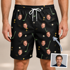 Man wearing Men's Wedge Whirl Custom Face Beach Shorts — custom faces printed all-over