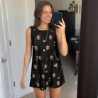 Real-life photo of someone wearing Women's Wedge Whirl Custom Face Tank Dress — custom faces printed all-over