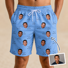 Man wearing Men's Iron Icons Custom Face Beach Shorts — custom faces printed all-over