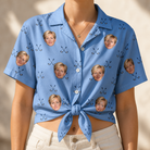 Woman wearing Women's Iron Icons Custom Face Hawaiian Shirt tied at the waist