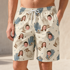 Model wearing Men's Grip Happens Custom Face Beach Shorts printed with kids' faces