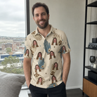 Real-life photo of someone wearing Men's Grip Happens Custom Face Polo Shirt — custom faces printed all-over