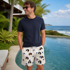 Real-life photo of someone wearing Men's Pin High Custom Face Beach Shorts — custom faces printed all-over