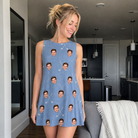 Real-life photo of someone wearing Women's Clubhouse Crossfire Custom Face Tank Dress — custom faces printed all-over