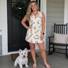 Full-length photo with the pet printed all over this Women's Knotty Companions Custom Dog Face V-Neck Dress