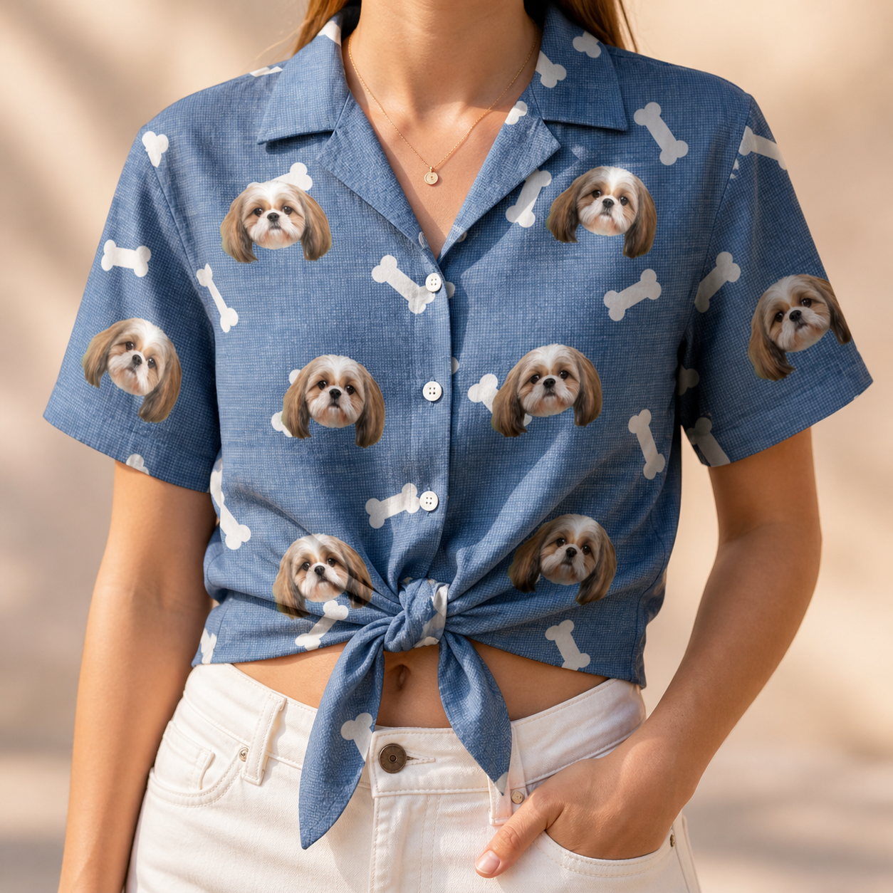 Woman wearing Women's Waggle Wafers Custom Dog Face Hawaiian Shirt tied at the waist