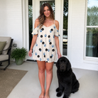 Full-length photo with the pet printed all over this Women's Puppy Prints Custom Dog Face Off-Shoulder Dress