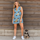 Full-length photo with the pet printed all over this Women's Mutt Munchies Custom Dog Face V-Neck Dress