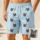 Man wearing Men's Pounce Patrol Custom Cat Face Beach Shorts — custom faces printed all-over