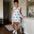 Full-length photo with the pet printed all over this Women's Pounce Patrol Custom Cat Face V-Neck Dress