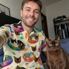 Selfie with the pet whose face is printed all over this Men's Catnap Cabins Custom Cat Face Polo Shirt