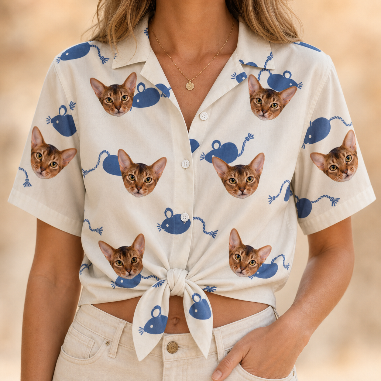 Woman wearing Women's Mouse Mêlée Custom Cat Face Hawaiian Shirt tied at the waist