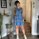 Full-length photo with the pet printed all over this Women's Tabby Tinkles Custom Cat Face Tank Dress