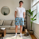 Full-length photo with the pet printed all over this Men's Toe Bean Trail Custom Cat Face Beach Shorts