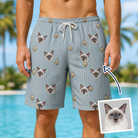 Man wearing Men's Purrcussion Pings Custom Cat Face Beach Shorts — custom faces printed all-over