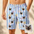 Man wearing Men's Naptime Nooks Custom Cat Face Beach Shorts — custom faces printed all-over