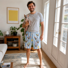 Full-length photo with the pet printed all over this Men's Naptime Nooks Custom Cat Face Beach Shorts
