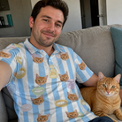 Selfie with the pet whose face is printed all over this Men's Naptime Nooks Custom Cat Face Polo Shirt