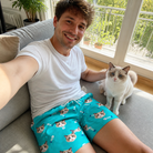 Selfie with the pet whose face is printed all over this Men's Purrfect Pisces Custom Cat Face Beach Shorts