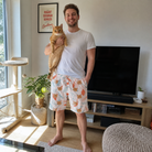 Full-length photo with the pet printed all over this Men's Kitty Plumes Custom Cat Face Beach Shorts