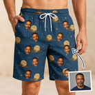 Man wearing Men's Lunar Laughs Custom Face Beach Shorts — custom faces printed all-over