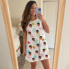 Real-life photo of someone wearing Women's Sticky Situation Custom Face Tank Dress — custom faces printed all-over