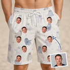Man wearing Men's Wraith Wiggles Custom Face Beach Shorts — custom faces printed all-over