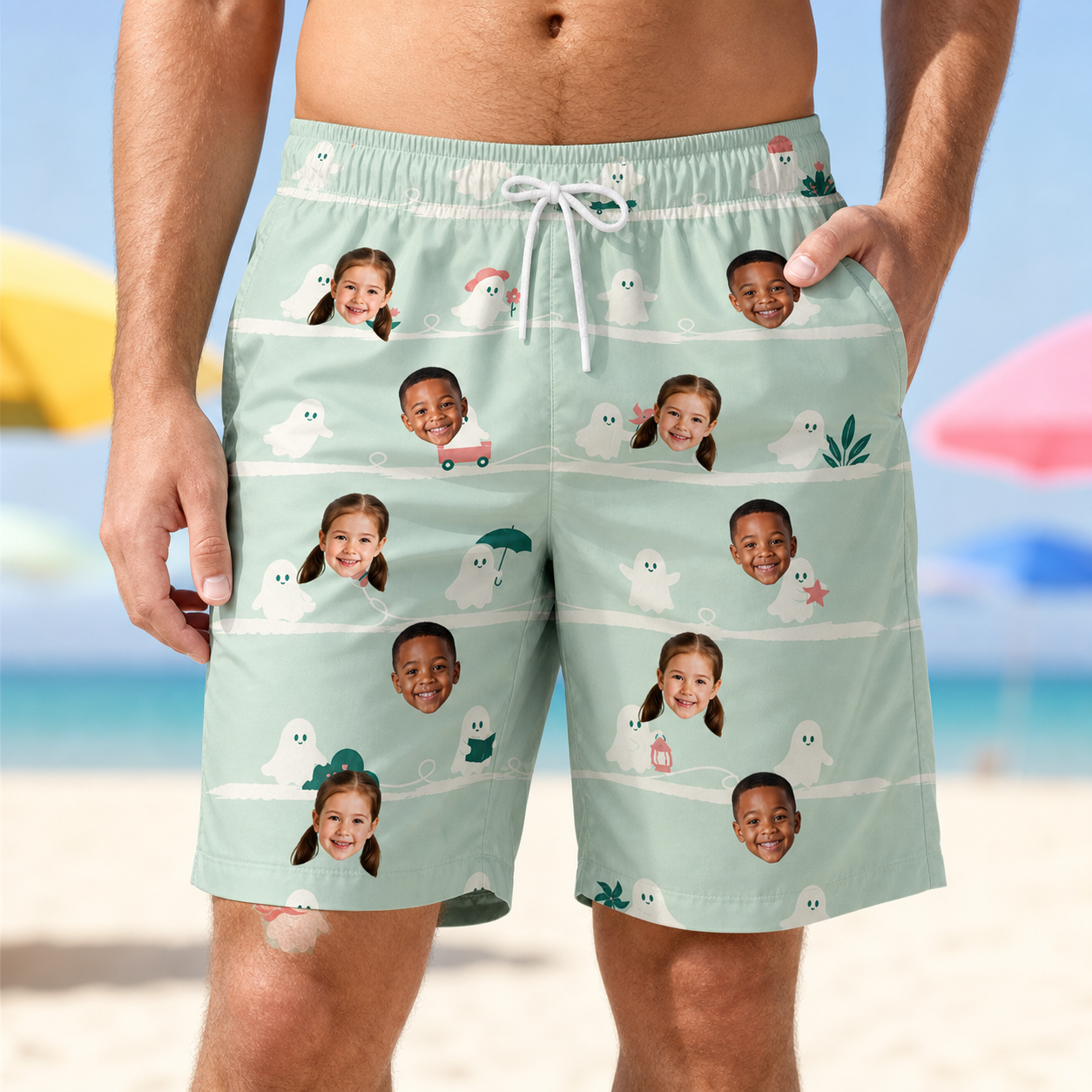 Model wearing Men's Ghostly Goofballs Custom Face Beach Shorts printed with kids' faces