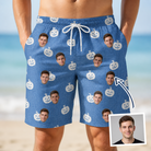 Man wearing Men's Autumn Orbs Custom Face Beach Shorts — custom faces printed all-over