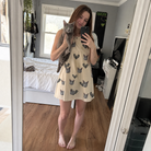 Full-length photo with the pet printed all over this Women's Winged Whispers Custom Cat Face Tank Dress