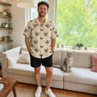 Full-length photo with the pet printed all over this Men's Winged Whispers Custom Cat Face Hawaiian Shirt