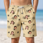 Model wearing Men's Sinister Strands Custom Face Beach Shorts printed with kids' faces