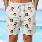 Model wearing Men's Eight-Legged Elegance Custom Face Beach Shorts printed with kids' faces