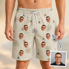 Man wearing Men's Gossamer Ghouls Custom Face Beach Shorts — custom faces printed all-over