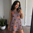 Real-life photo of someone wearing Women's Silken Scare Custom Face Tank Dress — custom faces printed all-over