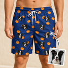 Man wearing Men's Orange Oddities Custom Dog Face Beach Shorts — custom faces printed all-over