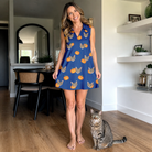 Full-length photo with the pet printed all over this Women's Orange Oddities Custom Cat Face V-Neck Dress