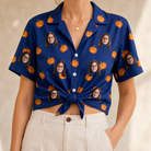 Woman wearing Women's Orange Oddities Custom Face Hawaiian Shirt tied at the waist
