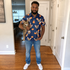 Full-length photo with the pet printed all over this Men's Orange Oddities Custom Cat Face Polo Shirt