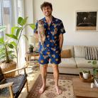 Full-length photo with the pet printed all over this Men's Orange Oddities Custom Cat Face Shirt & Shorts Set