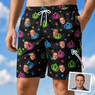 Man wearing Men's Lantern Lunacy Custom Face Beach Shorts — custom faces printed all-over