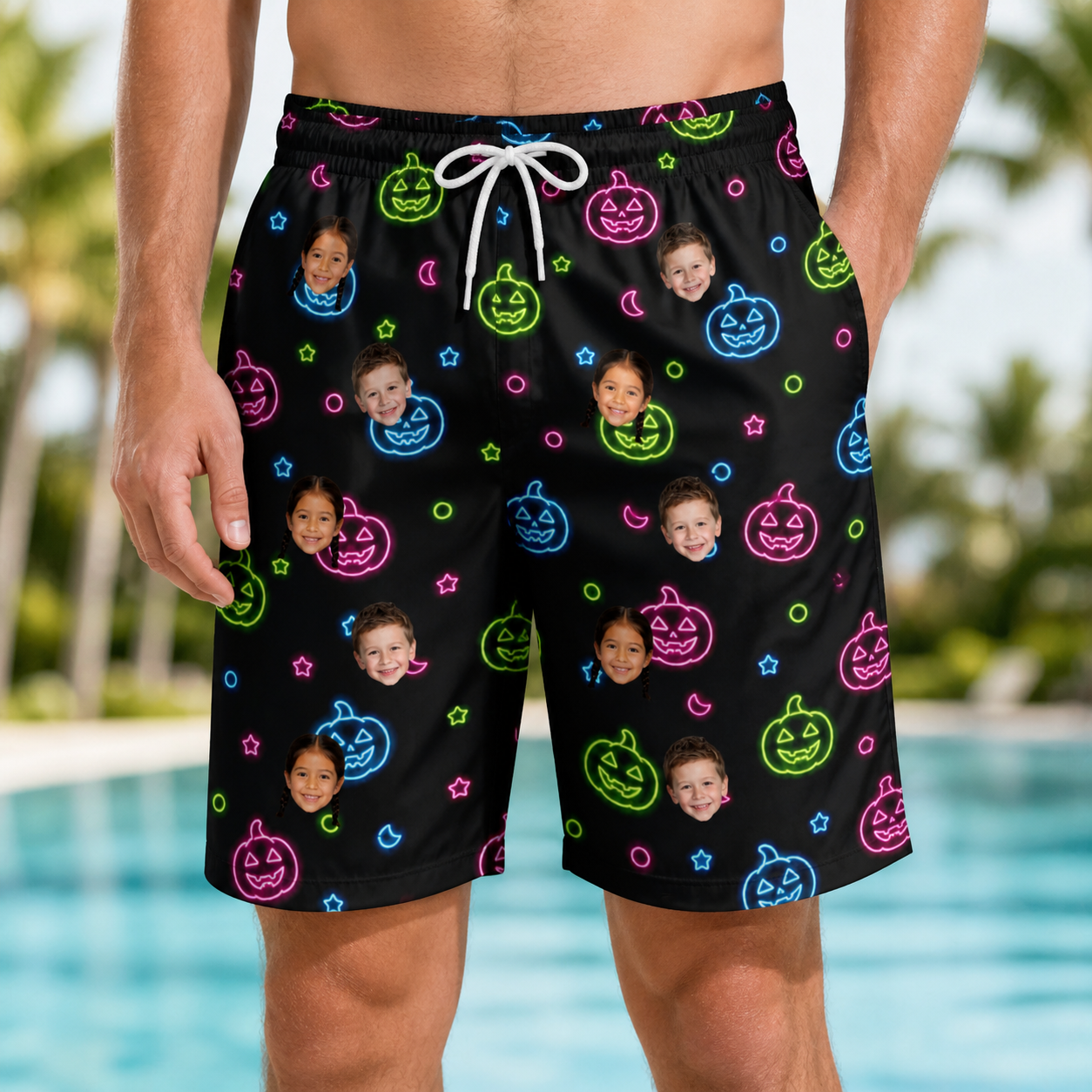 Model wearing Men's Lantern Lunacy Custom Face Beach Shorts printed with kids' faces