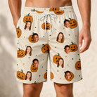 Model wearing Men's Ember Eyes Custom Face Beach Shorts printed with kids' faces