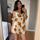 Real-life photo of someone wearing Women's Ember Eyes Custom Face Off-Shoulder Dress — custom faces printed all-over