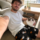 Selfie with the pet whose face is printed all over this Men's Cackle Carvings Custom Cat Face Beach Shorts